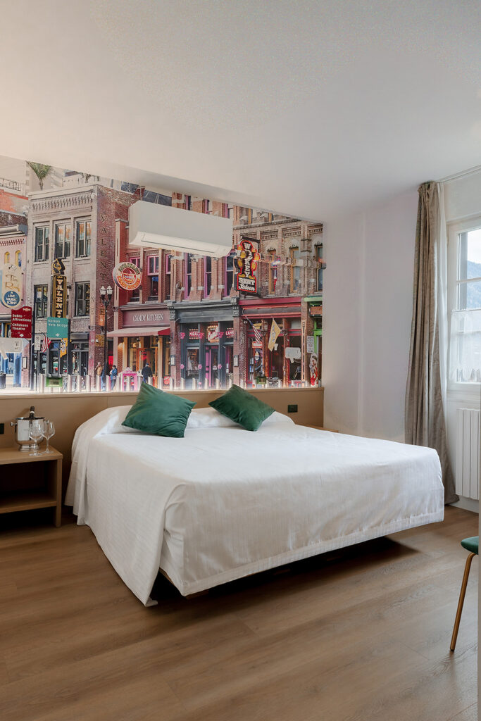 Interior photography of ValAmerica Hotel in Valtellina, showing guest rooms, curated details and dishes from the Ciao Bella restaurant, inspired by Italian hospitality with an American touch.